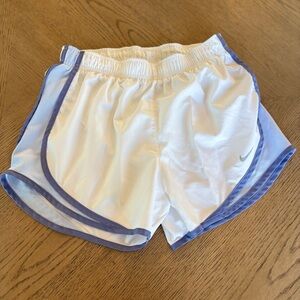 Nike Women's White Athletic Shorts with Blue Accents